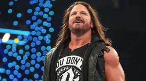 aj styles reacts to fan asking him to sign aew world championship